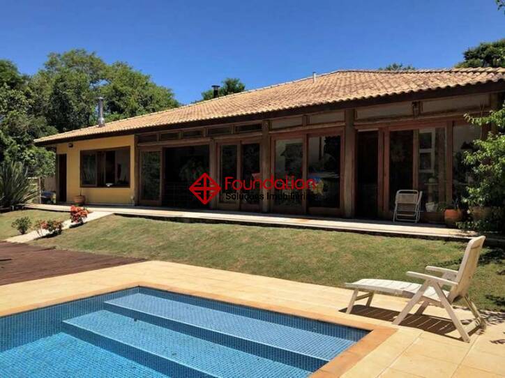 Casa de Condomínio à venda com 4 quartos, 342m² - Foto 1